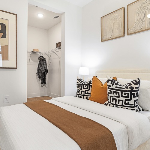 Bedroom options to fit every lifestyle bedroom with bed and wall art