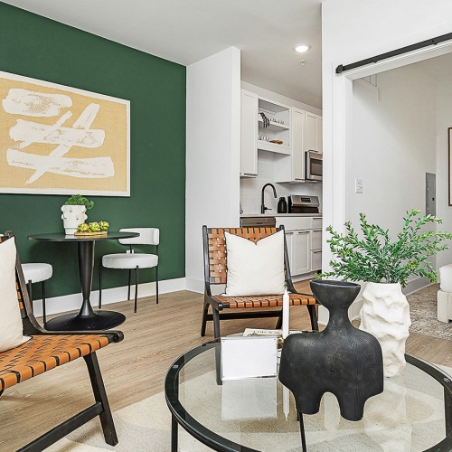 Beautiful living areas to match your lifestyle living room with chairs coffee table and green wall