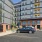 exterior of multilevel building with a parking lot