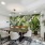 conference room with plants a table and chairs