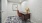small office with seating table and lamp