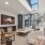 lounge area with seating and a tv